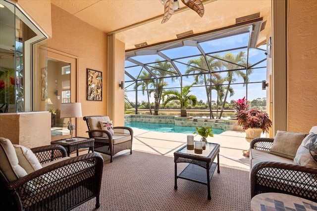 view of patio / terrace with an outdoor pool, an outdoor hangout area, and a lanai