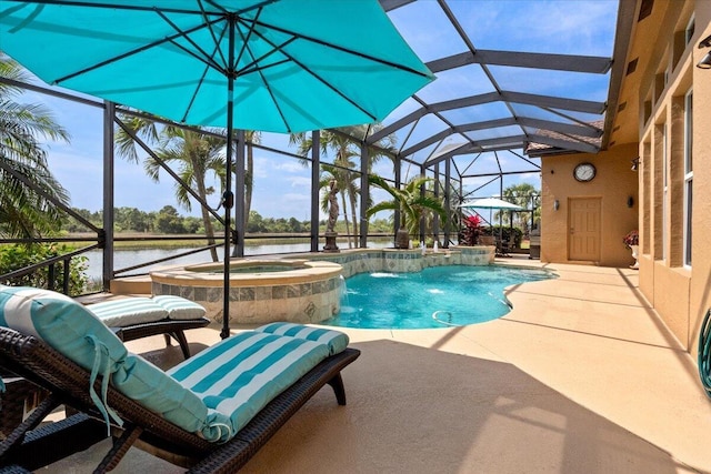 view of pool featuring a patio, a water view, a pool with connected hot tub, and a lanai