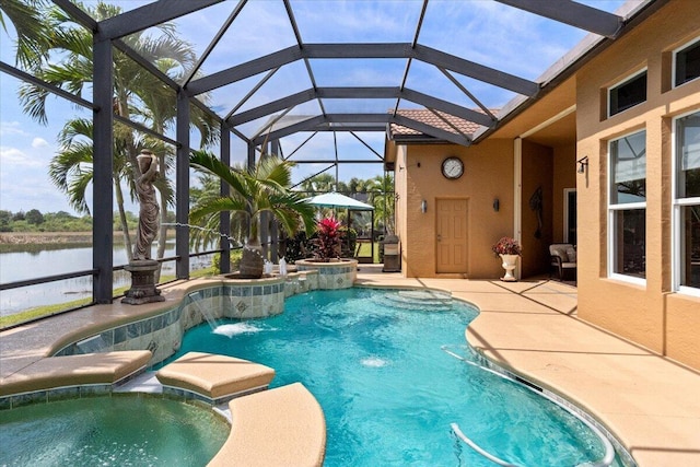 view of swimming pool with a patio area, a pool with connected hot tub, a lanai, and a water view