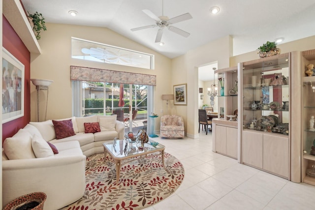 living room featuring light tile patterned floors, high vaulted ceiling, and a ceiling fan