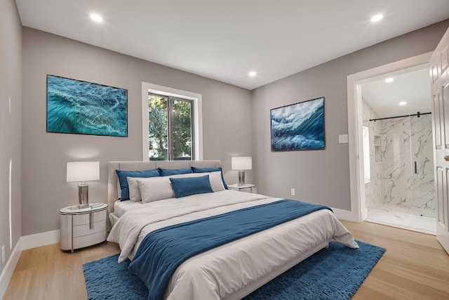 bedroom featuring recessed lighting, light wood-type flooring, and baseboards