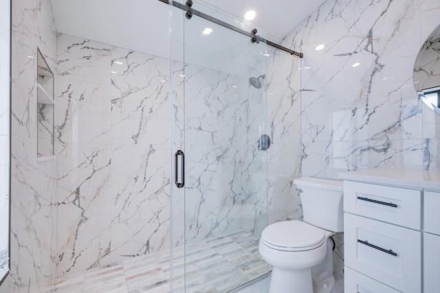 bathroom featuring a marble finish shower, toilet, stone wall, and vanity