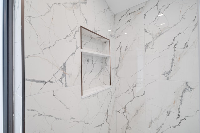 details with a marble finish shower