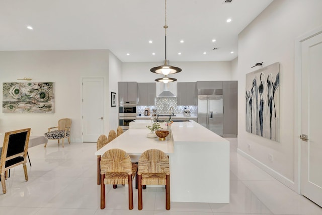 dining room featuring light tile patterned flooring, recessed lighting, and baseboards