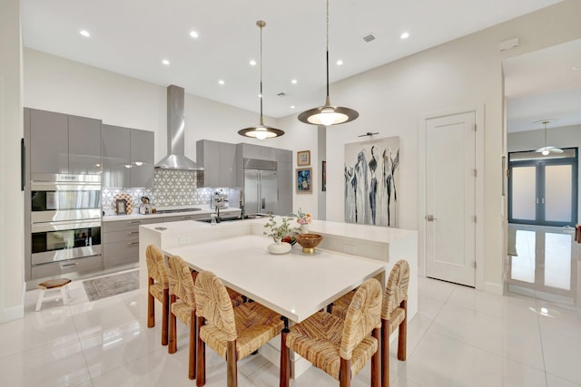 dining area with recessed lighting, visible vents, and light tile patterned flooring