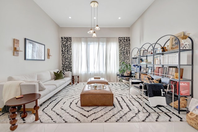 living area with tile patterned flooring and recessed lighting