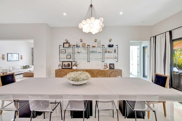 dining room featuring recessed lighting and a chandelier