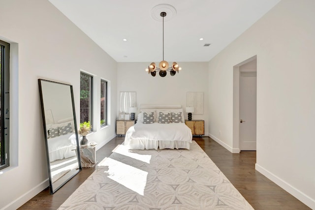 bedroom featuring recessed lighting, baseboards, a chandelier, and dark wood-style flooring