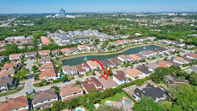 aerial view featuring a residential view and a water view