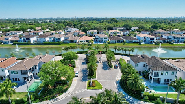 aerial view with a residential view and a water view