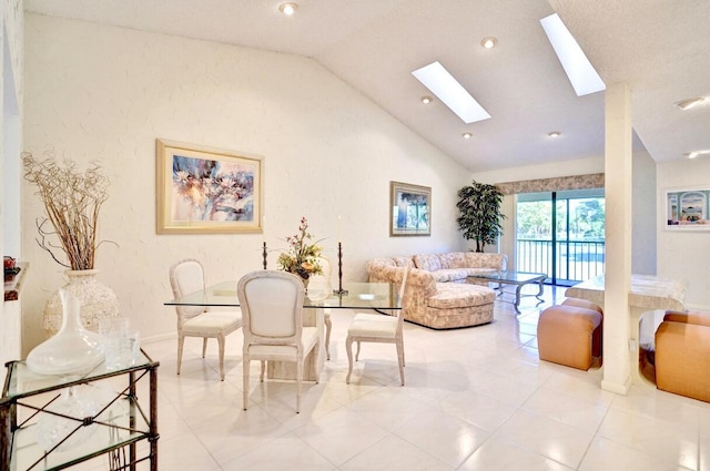 interior space with lofted ceiling with skylight