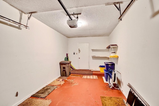 garage featuring baseboards and a garage door opener