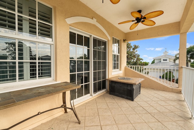 view of patio / terrace with a ceiling fan