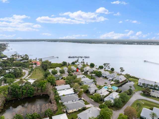 aerial view with a residential view and a water view