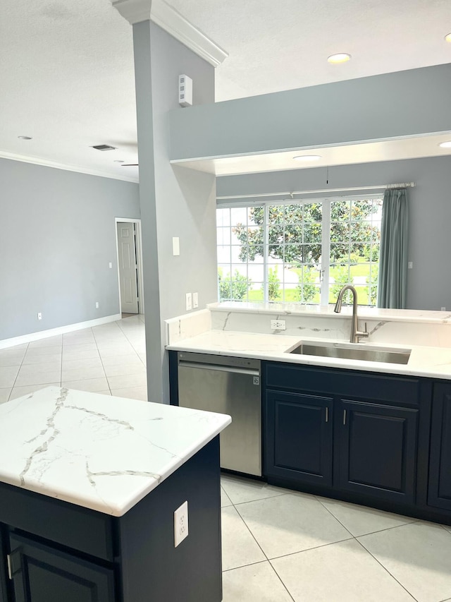2010 NW Estuary Ct, Stuart, FL 34994 - kitchen featuring stainless steel dishwasher, light tile patterned floors, crown molding, healthy amount of natural light, and recessed lighting