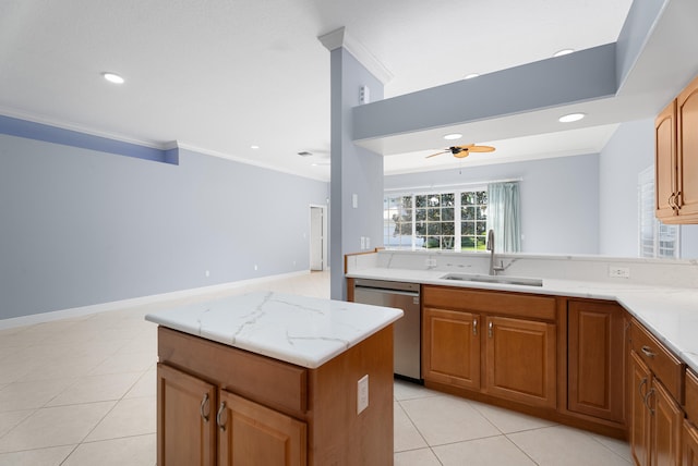 kitchen with stainless steel dishwasher, crown molding, a ceiling fan, and a sink