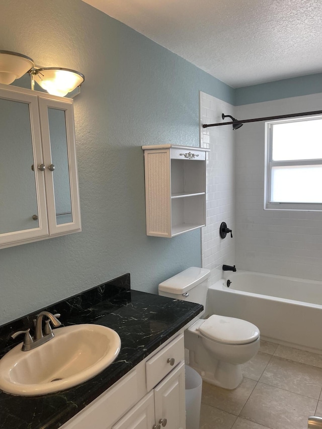 bathroom with tile patterned flooring, toilet, vanity, shower / bath combination, and a textured ceiling