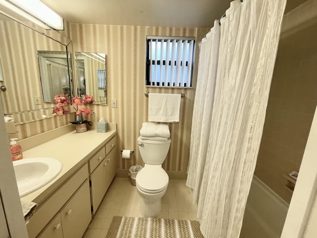 bathroom with toilet, tile patterned flooring, shower / tub combo, wallpapered walls, and vanity