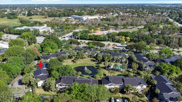 aerial view featuring a residential view and a water view