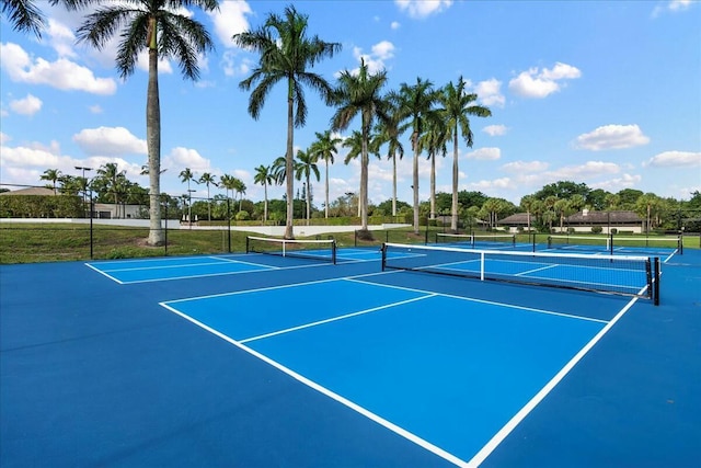 view of sport court with fence