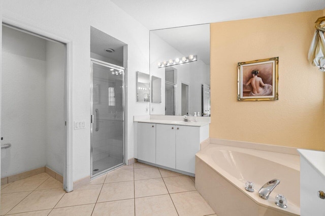 full bathroom with tile patterned floors, a stall shower, vanity, and a bath