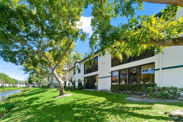 exterior space with a water view