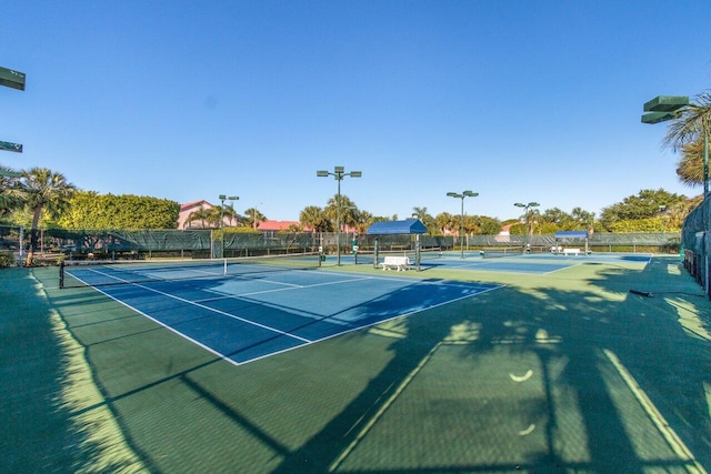 view of sport court with fence