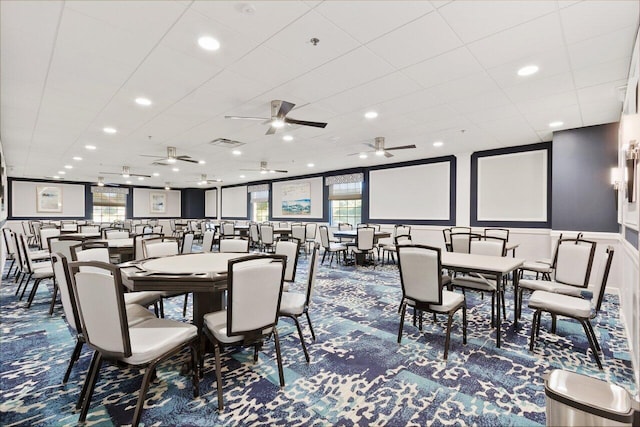 dining room with recessed lighting, visible vents, carpet, and a decorative wall