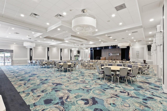 dining area with visible vents, carpet floors, and ornamental molding