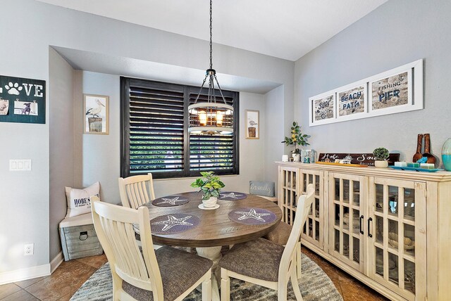 tiled dining space with baseboards