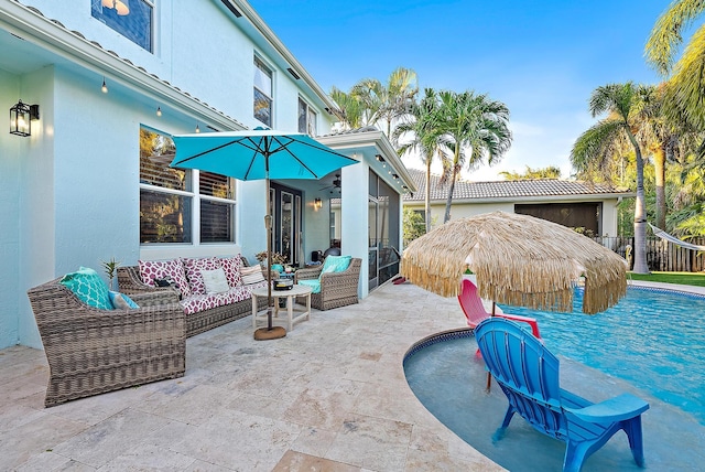 view of pool featuring a pool, an outdoor hangout area, and a patio