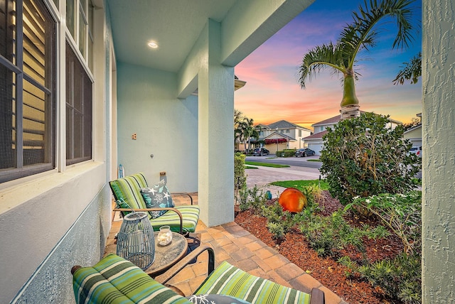 view of patio terrace at dusk