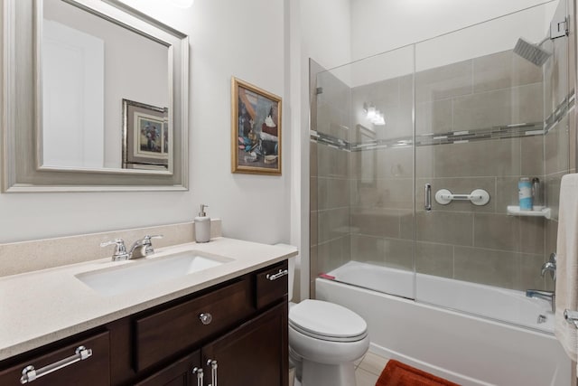 full bathroom with toilet, vanity, and shower / bath combination with glass door