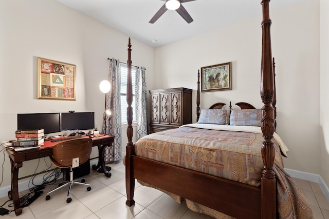 bedroom with light tile patterned floors, baseboards, and ceiling fan
