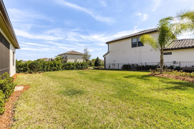 view of yard featuring fence