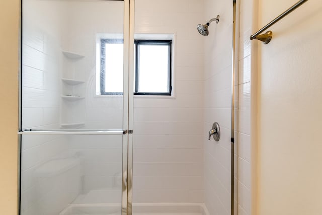 bathroom with a stall shower