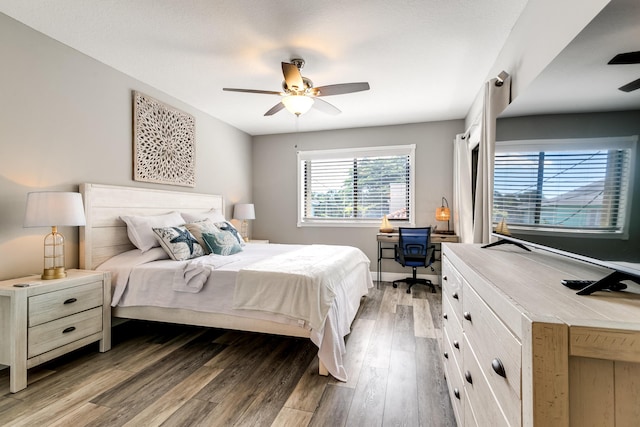 bedroom featuring ceiling fan and light wood-style floors