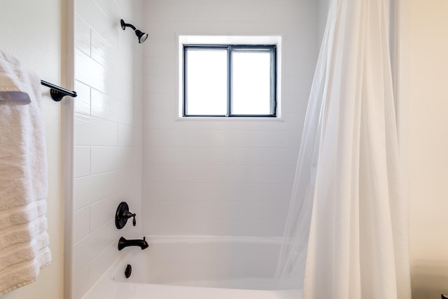 bathroom featuring shower / tub combo