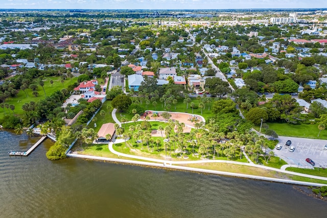 birds eye view of property featuring a water view and a residential view