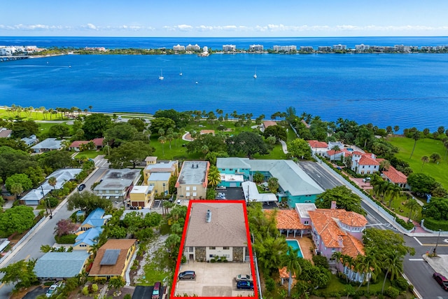 bird's eye view featuring a residential view and a water view