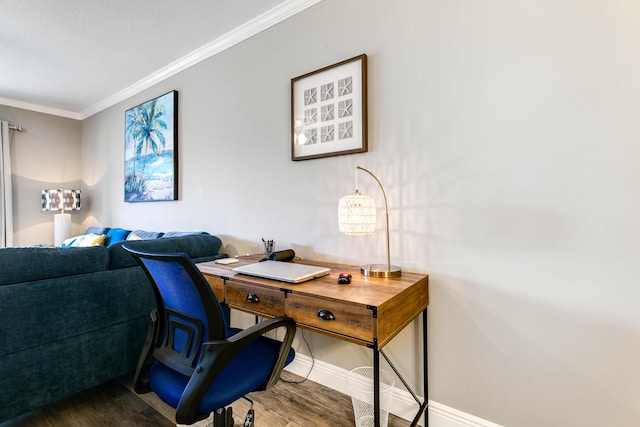 home office with crown molding, baseboards, and wood finished floors