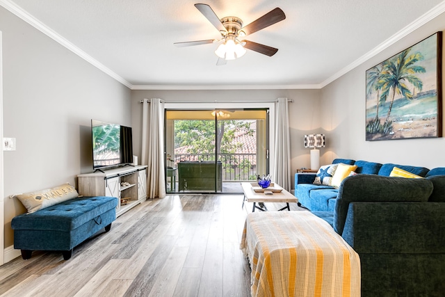 living area featuring crown molding, a ceiling fan, and wood finished floors