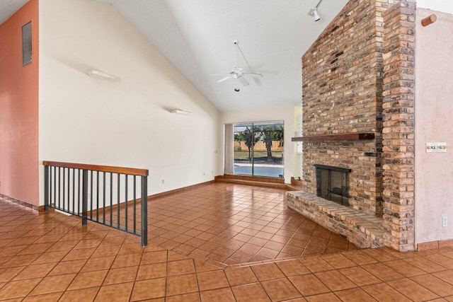 unfurnished living room featuring high vaulted ceiling, a fireplace, a ceiling fan, visible vents, and tile patterned flooring
