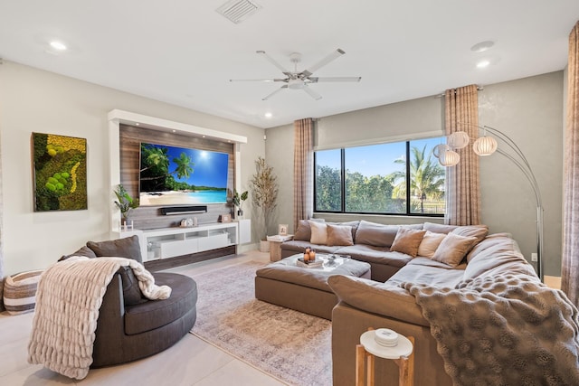 tiled living room featuring a ceiling fan, recessed lighting, and visible vents