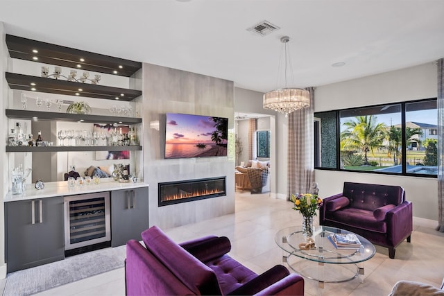 living room with wine cooler, tile patterned floors, indoor bar, and visible vents