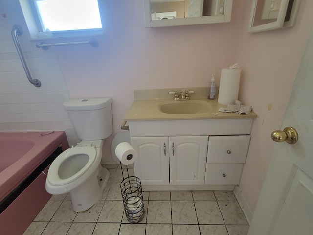 bathroom with vanity, tile patterned flooring, a shower, toilet, and a bathtub