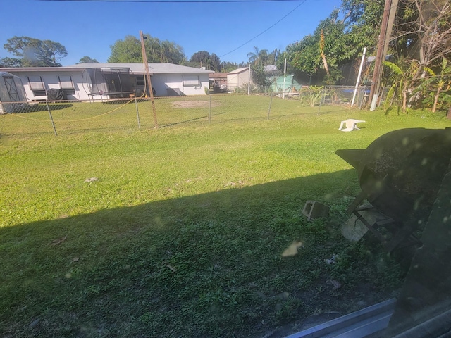 view of yard with fence