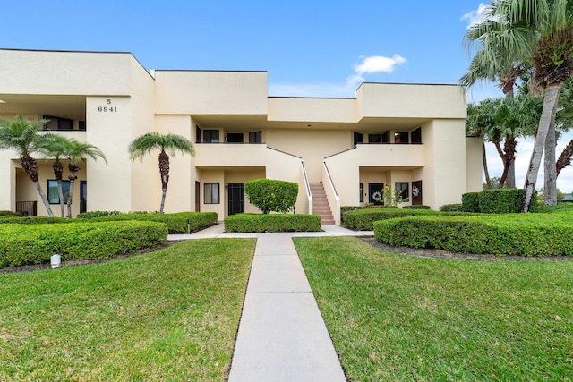 6941 SE Constitution Blvd Unit 101, Hobe Sound, FL 33455 - view of building exterior