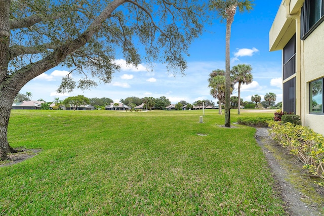 6941 SE Constitution Blvd Unit 101, Hobe Sound, FL 33455 - view of green lawn