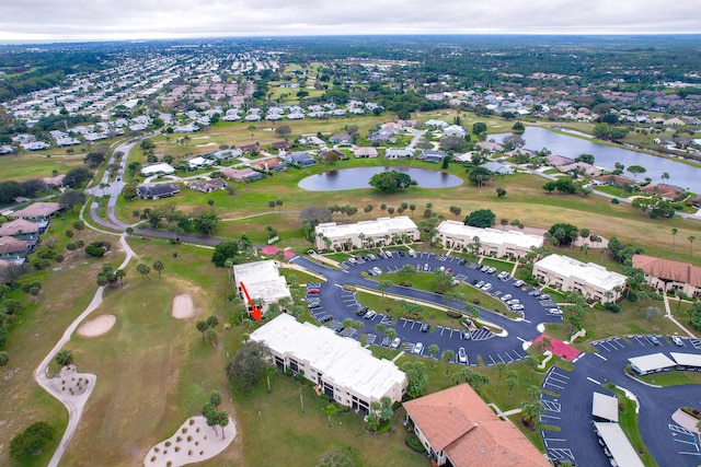 aerial view featuring a residential view and a water view